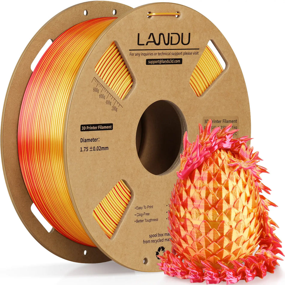 LANDU Red and Yellow Dual Color Silk PLA 3D printer filament 1kg spool displaying a fiery 3D printed color shifting dragon and egg.