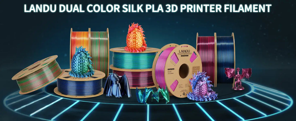 LANDU Dual Color Silk PLA 3D printer filament spools showcasing vibrant printed dragons and eggs on a futuristic background.