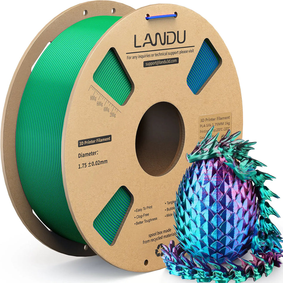 LANDU Red Green Blue Tri-Color Silk PLA 3D printer filament 1kg spool with a vibrant chameleon-like color-shifting 3D printed dragon.